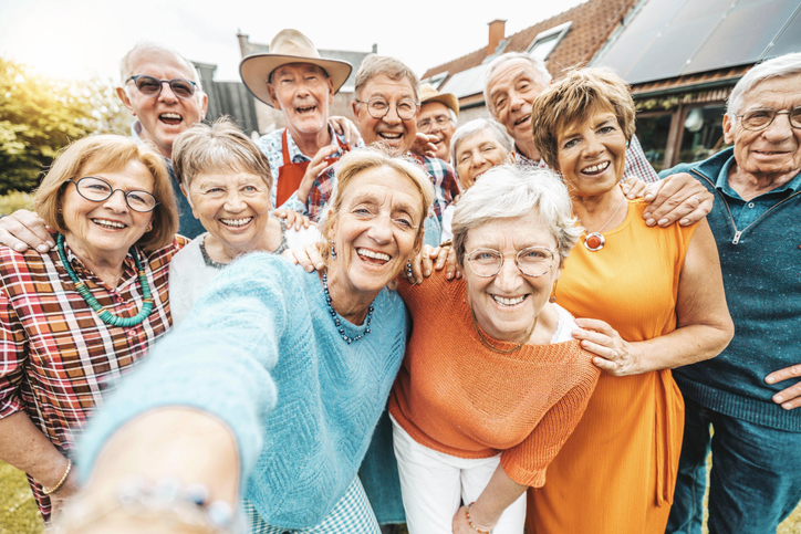 A group of senior friends taking a fun photo of themselves