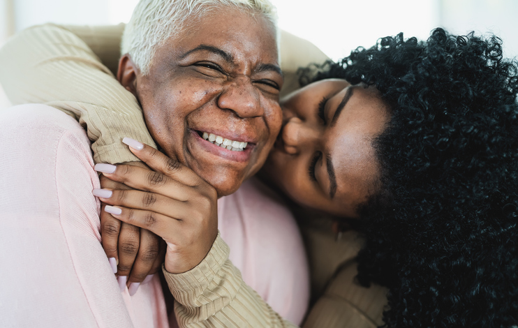 Older mother and younger daughter enjoying time together